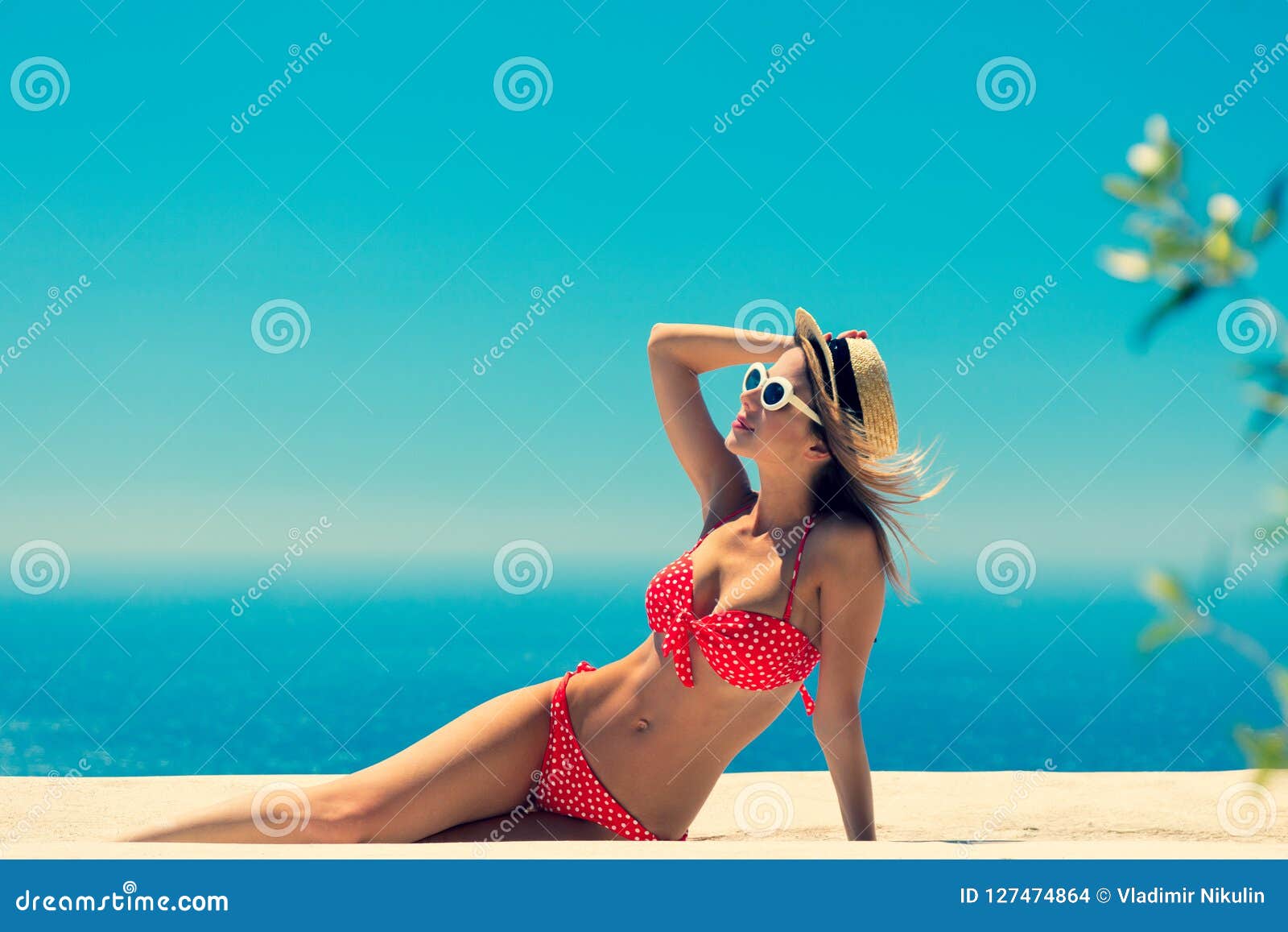 girl bikini blue sea sky background