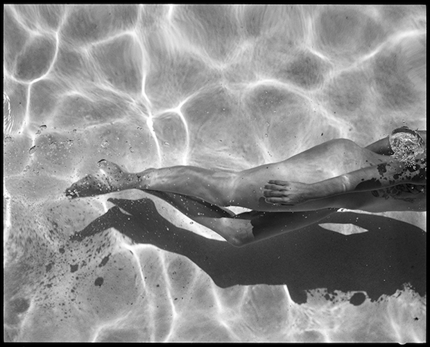 hazy dreamlike photographs of swimming nudes